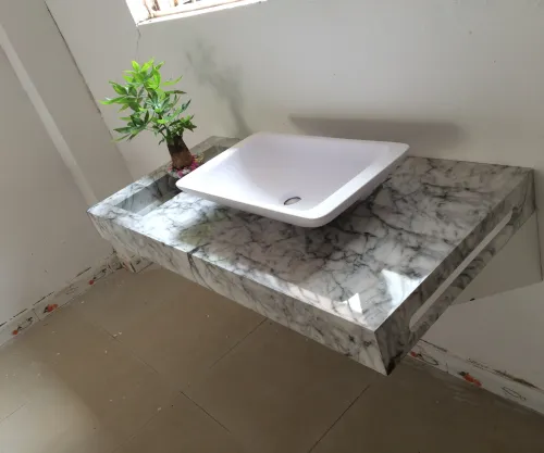 How to deal with black spots on the quartz stone countertop in the bathroom