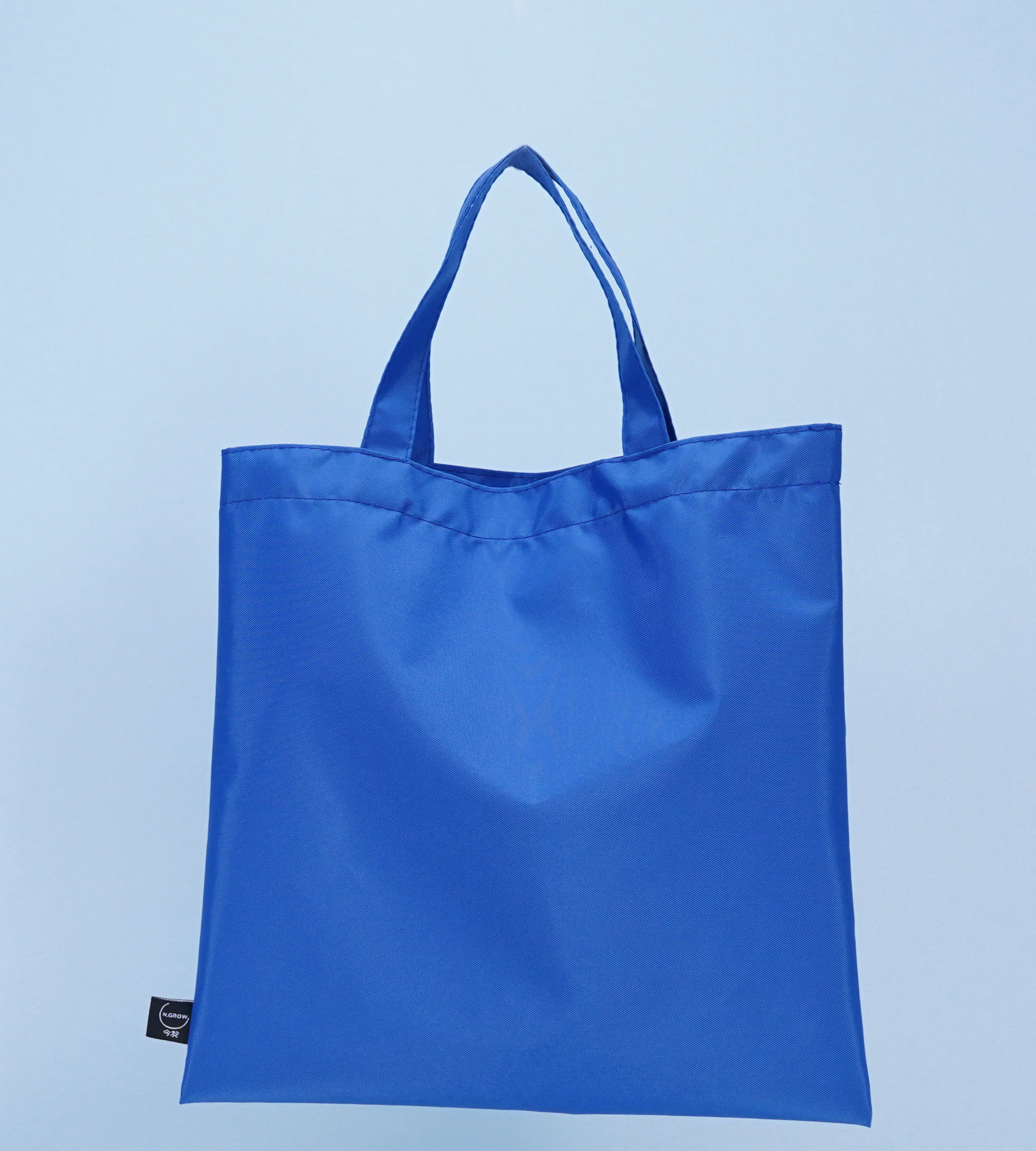 सुविधा के लिए डिज़ाइन किया गया: एक अनुकूलन योग्य नायलॉन पॉलिएस्टर टोट बैग के साथ अपने जीवन को सरल बनाएं